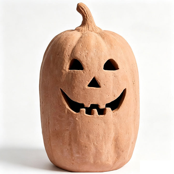 Handmade clay pumpkin lantern